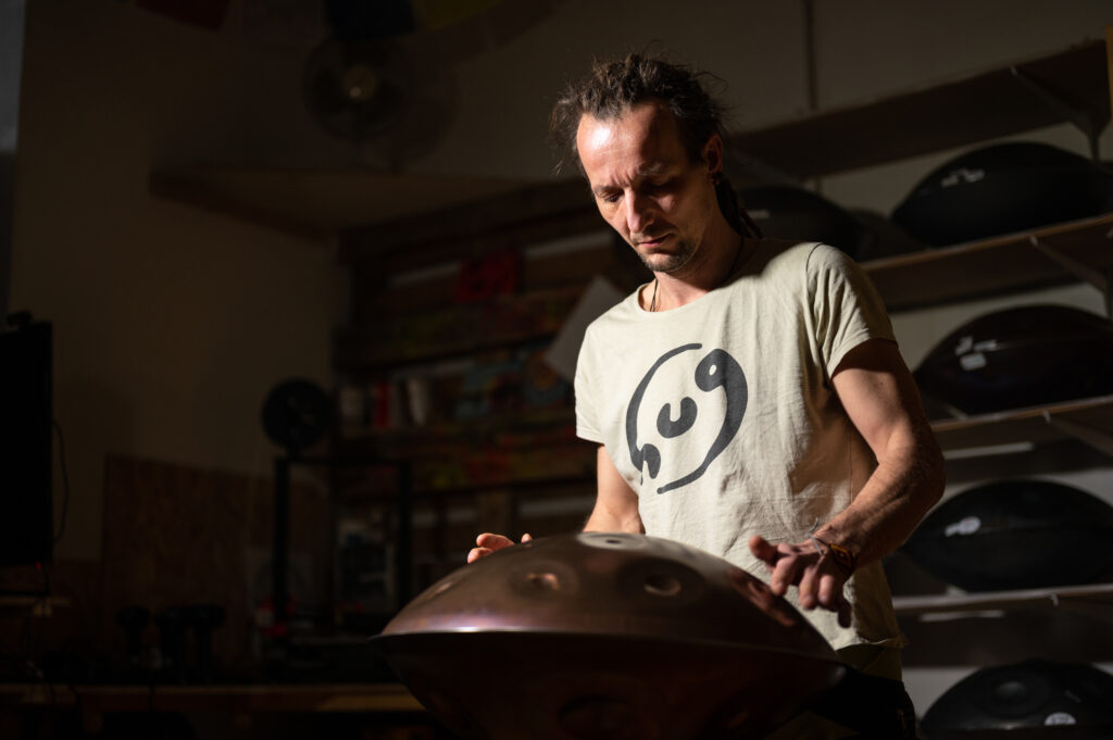 Handpan musician playing the instrument